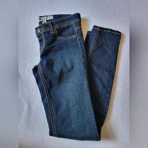 Wet Seal pull on jeans, fake pockets/zipper, has a botton hole